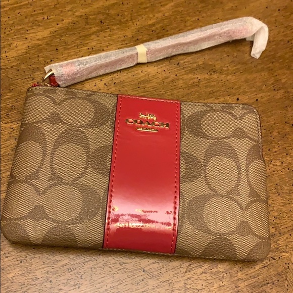 Coach Handbags - Khaki & true red accent Coach wristlet